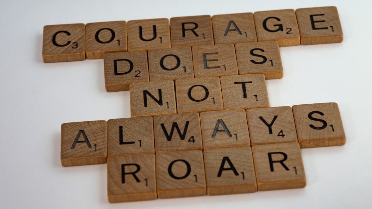 scrabble, scrabble pieces, lettering, letters, wood, scrabble tiles, words, quote, wisdom, courage does not always roar, courage, true courage, real courage, meekness